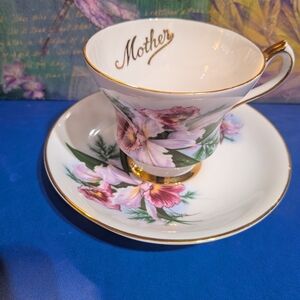 Crown Prince Bone China,England. Floral Teacup and Saucer with Gold Accents